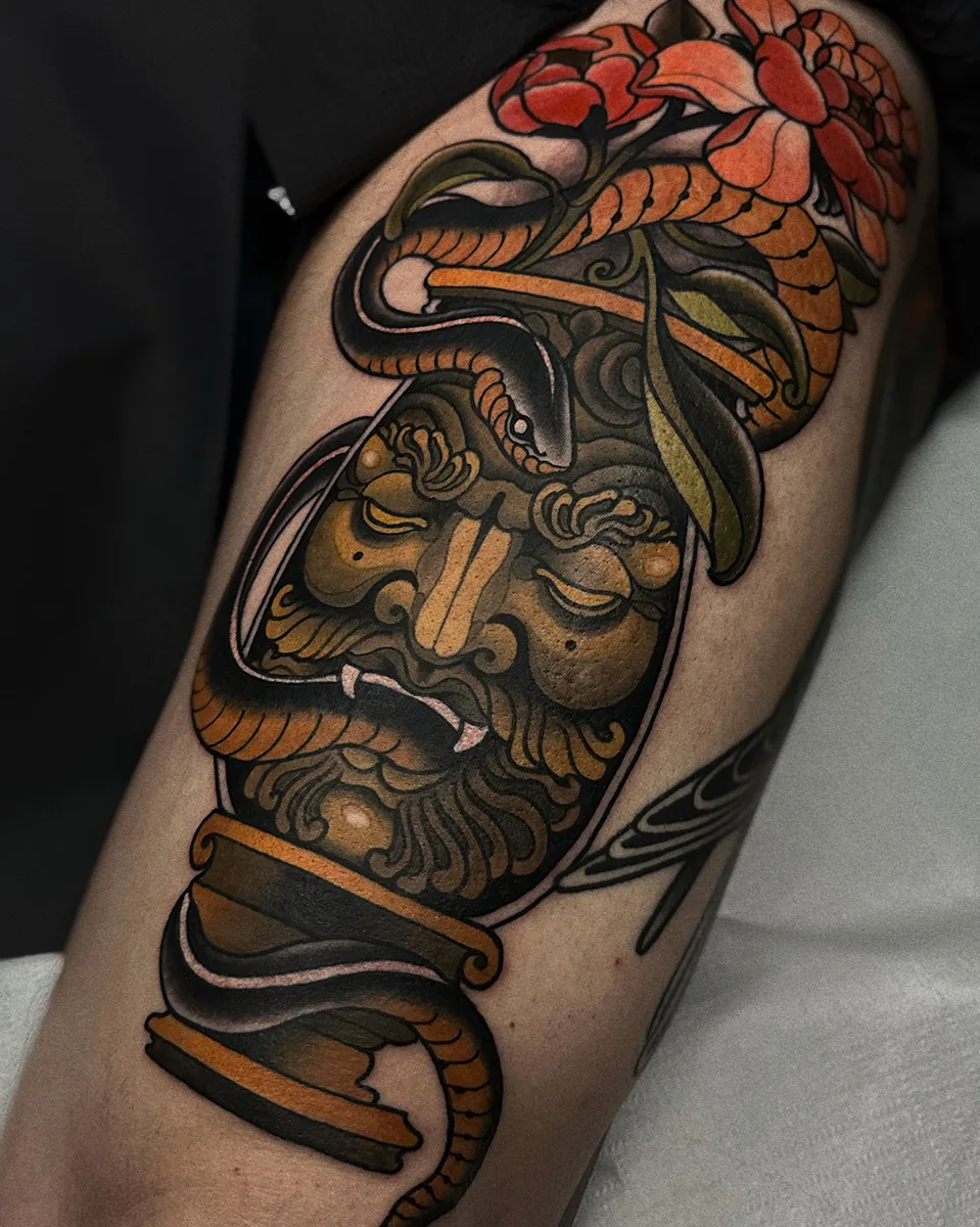 Neotraditional tattoo on leg